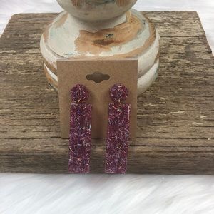 New fashion earrings. Purple with sprinkles on it